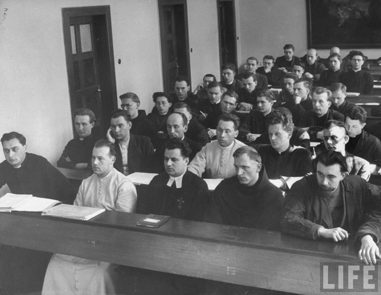 Students from seminary at Charles University and members of Franciscan and other religious orders at the university attending lecture on Kant by theology faculty professor.