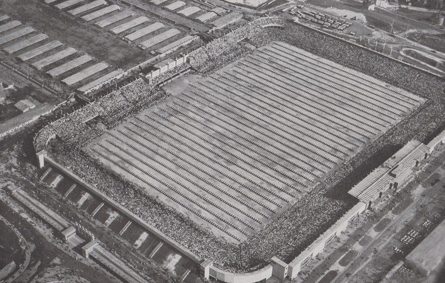 IN PERFECT UNISON, 16,000 SOKOLS DRILL AS COLUMNS OF 500 IN A PACKED PRAHA STADIUM.