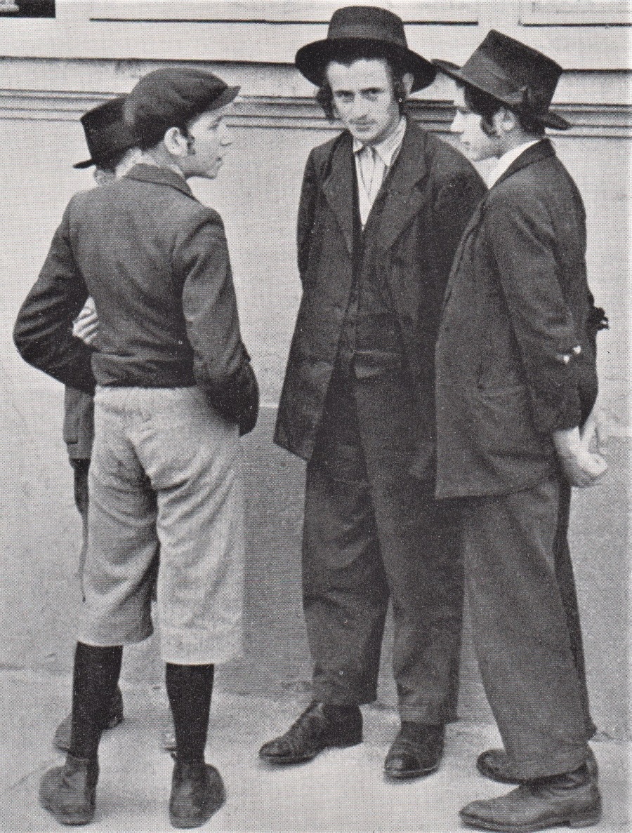 ORTHODOX JEWS IN RUTHENIA WEAR CURLY SIDEBURNS. 