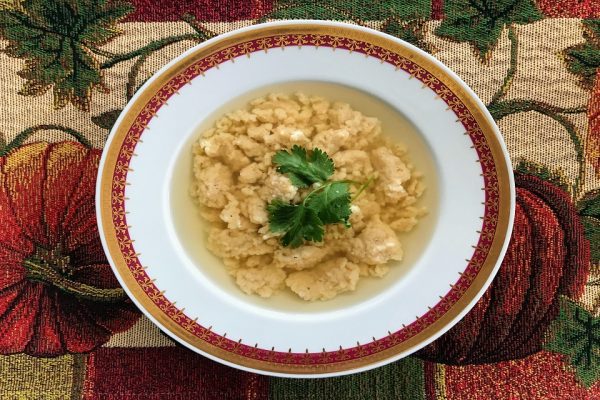 Broth with egg drop dumplings